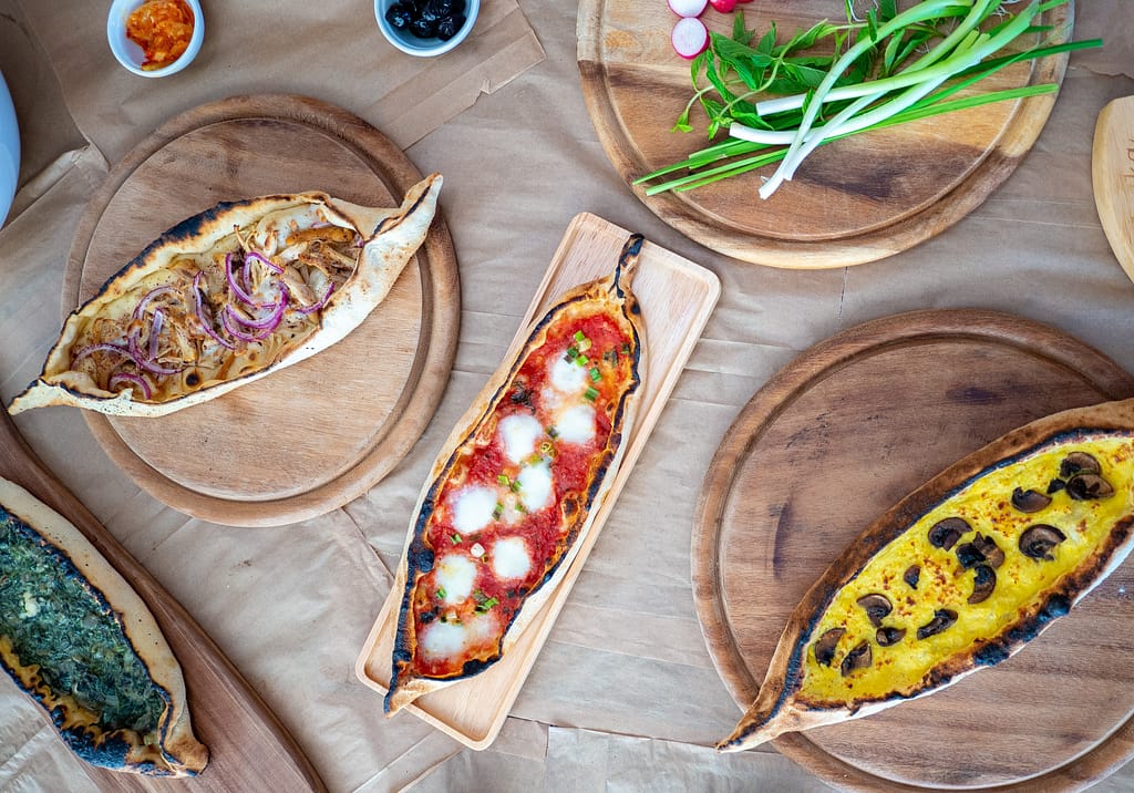 "Pide" is a boat-shaped hybrid of pie and pizza with countless filling options in Istanbul, Turkey.
